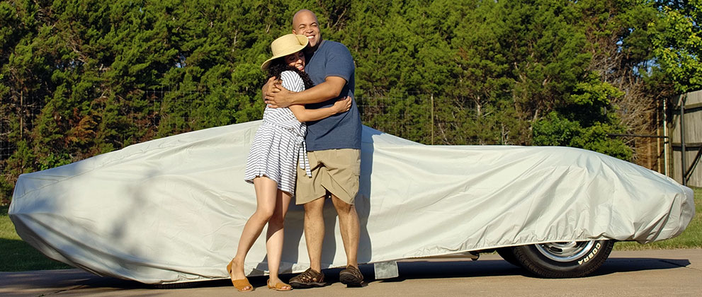 happy customers with covered car